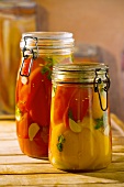 Pickled peppers in two jars