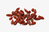 Dried goji berries on white background