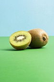 Kiwi fruits, whole and half