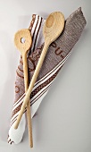 Wooden spoons and tea towel