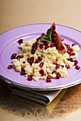 Couscous with pomegranate seeds, mint and blood orange
