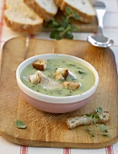 Ramsons (wild garlic) soup with fish and croutons