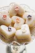 Heart-shaped petit fours with sugar flowers