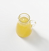 Pear syrup in glass jug