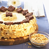 Malakoff cake with flaked almonds