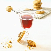 Savoury biscuits and a glass of red wine