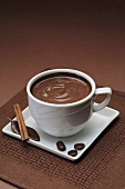 Chocolate sauce in white cup