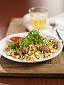 Meatballs with couscous and rocket