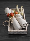 Fabric napkins decorated with rose hips
