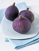 Three figs on plate