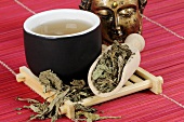 Dried Chinese field mint and bowl of tea