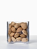 Almonds in glass bowl