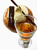 Rum baba and glass of rum