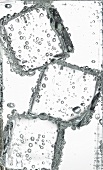 Mineral water with ice cubes (close-up)