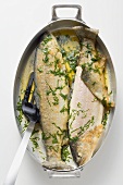 Two trout roasted in olive oil