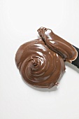 A blob of Nutella with knife