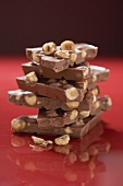 Several pieces of hazelnut chocolate, stacked