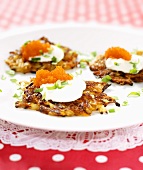 Potato rösti with sour cream, caviar and salmon