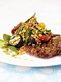 Grilled chop with wheat and vegetable salad