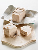 Yeast cubes on a chopping board