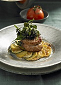 Veal medaillons on potato-courgette gratin