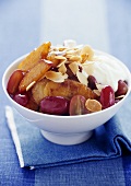 Plum & grape compote with crème double & slivered almonds