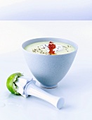 Lime vichyssoise with salmon roe; lemon squeezer with lime