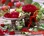 Table decorated with roses in open air