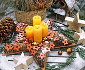 Star-shaped Advent wreath in snow