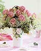 Vase of roses and Gypsophila