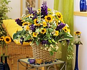 Arrangement of delphiniums, sunflowers and Coreopsis