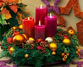 Advent wreath of Noble fir and rose hips