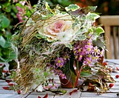 Autumn wreath of ornamental cabbage and Michaelmas daisies