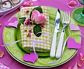 Place setting with hearts and roses