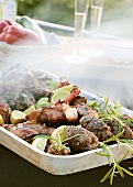 Barbecued food: minced lamb kebabs & bacon-wrapped chicken