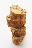 Four slices of wholemeal baguette, stacked