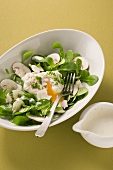 Corn salad with button mushrooms and poached egg