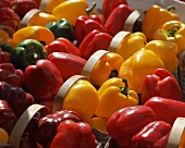 Peppers in baskets on a market stall