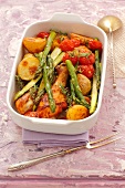 Chicken drumsticks with new potatoes, green asparagus & cherry tomatoes