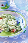 Broccoli and cauliflower gratin with herb sauce