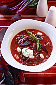 Beetroot soup with beans and sour cream