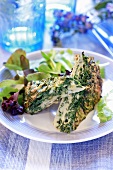 Spinach omelette with salad garnish