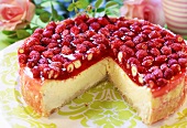 Wild strawberry cheesecake, a piece removed