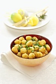 Deep-fried potato balls with parsley for Easter
