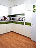 White kitchen with a green stripe
