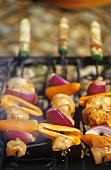Chicken and vegetable kebabs on the barbecue