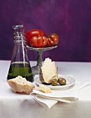 White bread, Parmesan, olives, olive oil and tomatoes