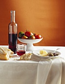White bread, olives, Parmesan, red wine and tomatoes