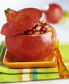 A pomegranate with the top cut off