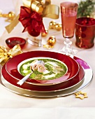 Creamed spinach soup with ham and asparagus rolls